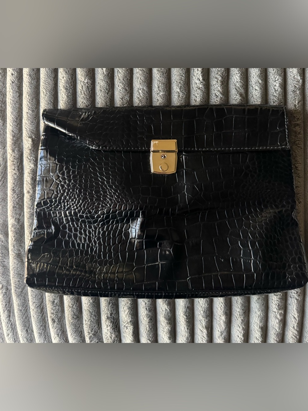 Black crocodile clutch
